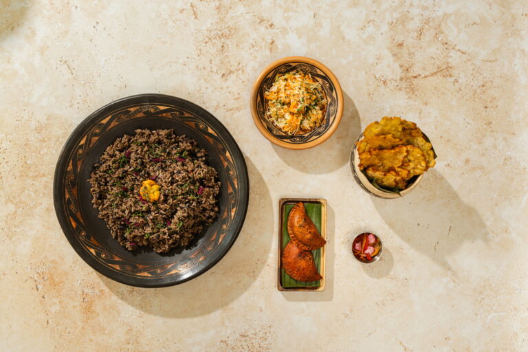Our sides — rice and beans, patacones, brisket empanadas and creole slaw. Caribbean soul tasting menu by rlt cuisine, playa potrero, guanacaste, costa rica.